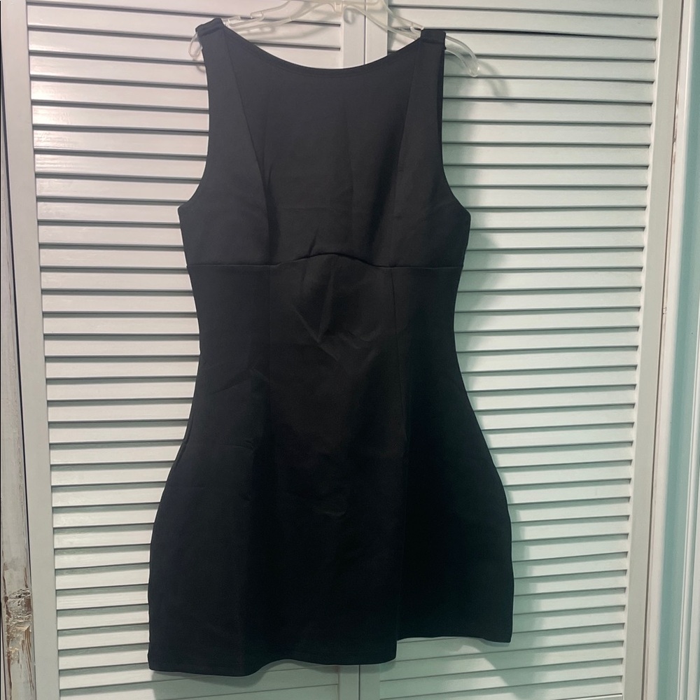 Classic Black Sleeveless Sheath Dress